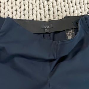 Professional, comfortable Navy dress pants. Straight leg with side zipper.